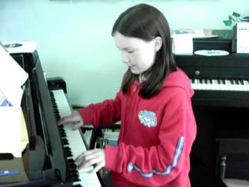 Hannah Manning on the piano